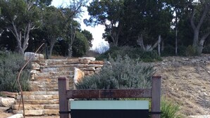 A sign for Hilltop Smokehouse.