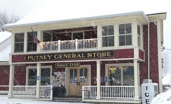 A two-story general store with a sign reading "Putney General Store" and "Since 1796".