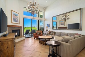 Smart TV, fireplace, books, offices