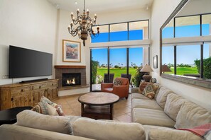 Smart TV, fireplace, books, offices