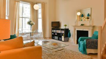 Smart TV, DVD player, books, video library