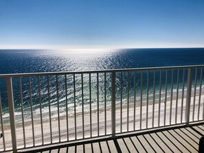 A balcony with a view of the ocean and beach. - ROMANTIC & CHIC - UNFORGETTABLE, ENCHANTING BEACH RETREAT! LIMITLESS GULF VIEWS! (Gulf Shores)
