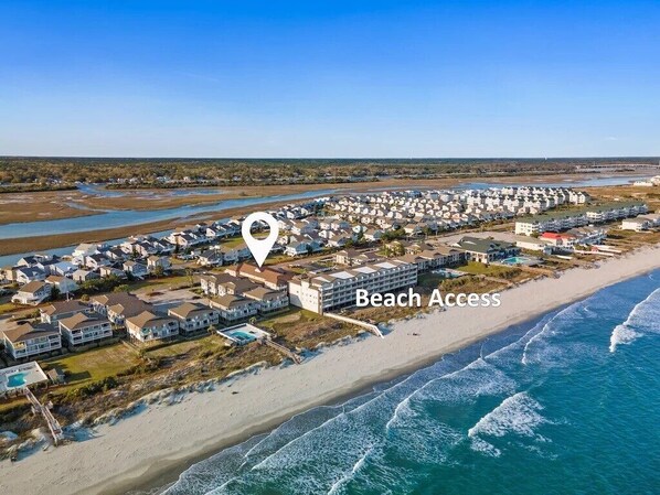 On the beach, sun-loungers