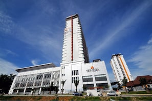 A modern building with a prominent vertical structure and a sign reading "TENERA". - Hotel Tenera (Bandar Baru Bangi)