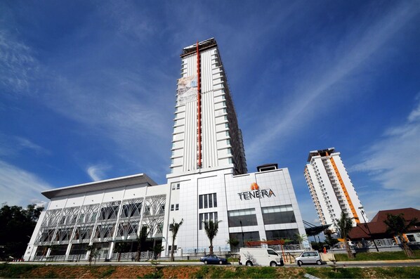 A modern building with a prominent vertical structure and a sign reading "TENERA". - Hotel Tenera (Bandar Baru Bangi)