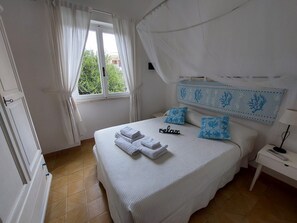 2 bedrooms, in-room safe, iron/ironing board, travel cot