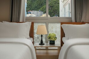 Executive Quadruple Room | Minibar, desk, free WiFi - Pina Boutique Inn - Hotel Elite (Hai Phong)