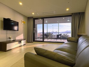 Luxe suite | Woonruimte | Flatscreentelevisie