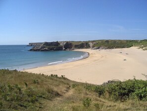 Beach nearby, sun loungers