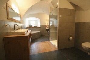 Bathtub, hair dryer, towels, soap