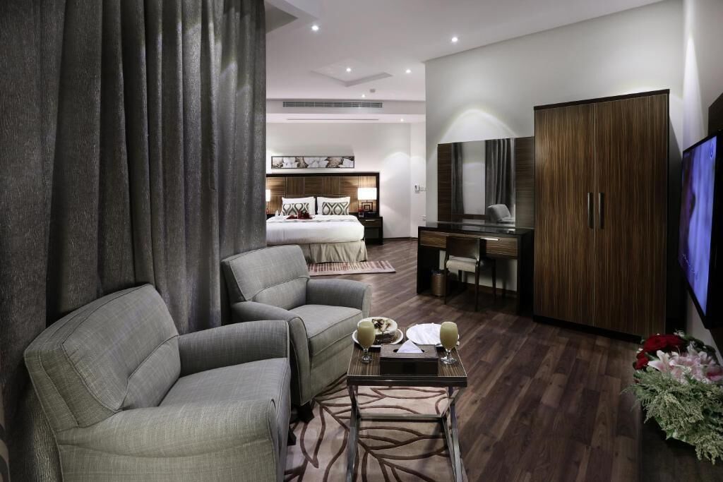 Apartemen Deluks, 2 kamar tidur | Brankas, kedap suara, setrika/meja setrika, dan tempat tidur bayi gratis