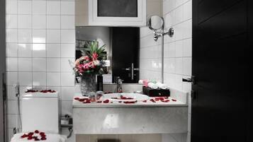 Shower, free toiletries, slippers, towels