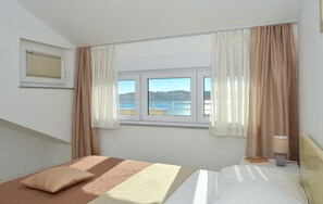 2 室のベッドルーム、アイロン / アイロン台、WiFi (無料)、ベッドシーツ