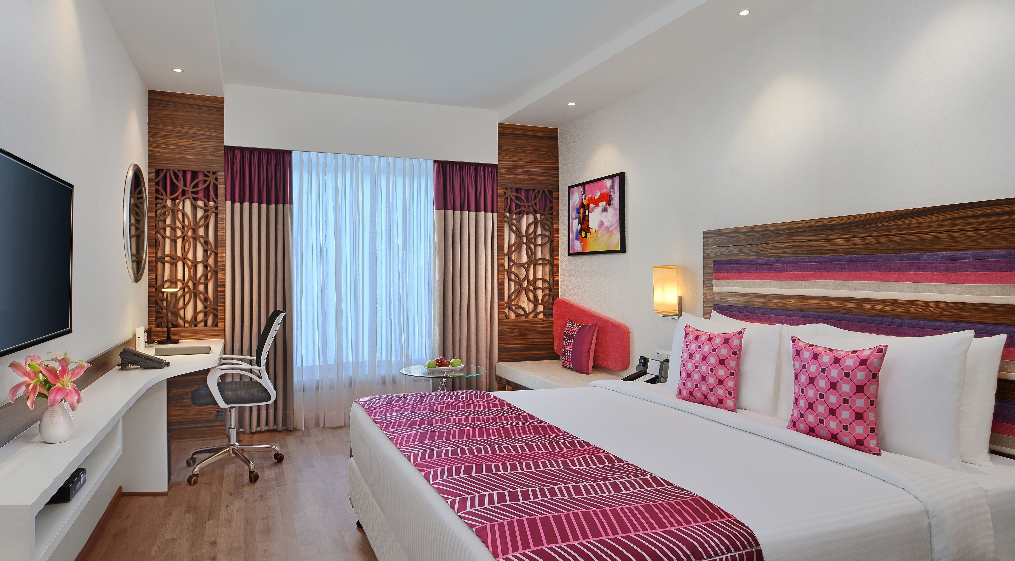 deluxe room | premium bedding, minibar, in-room safe, desk