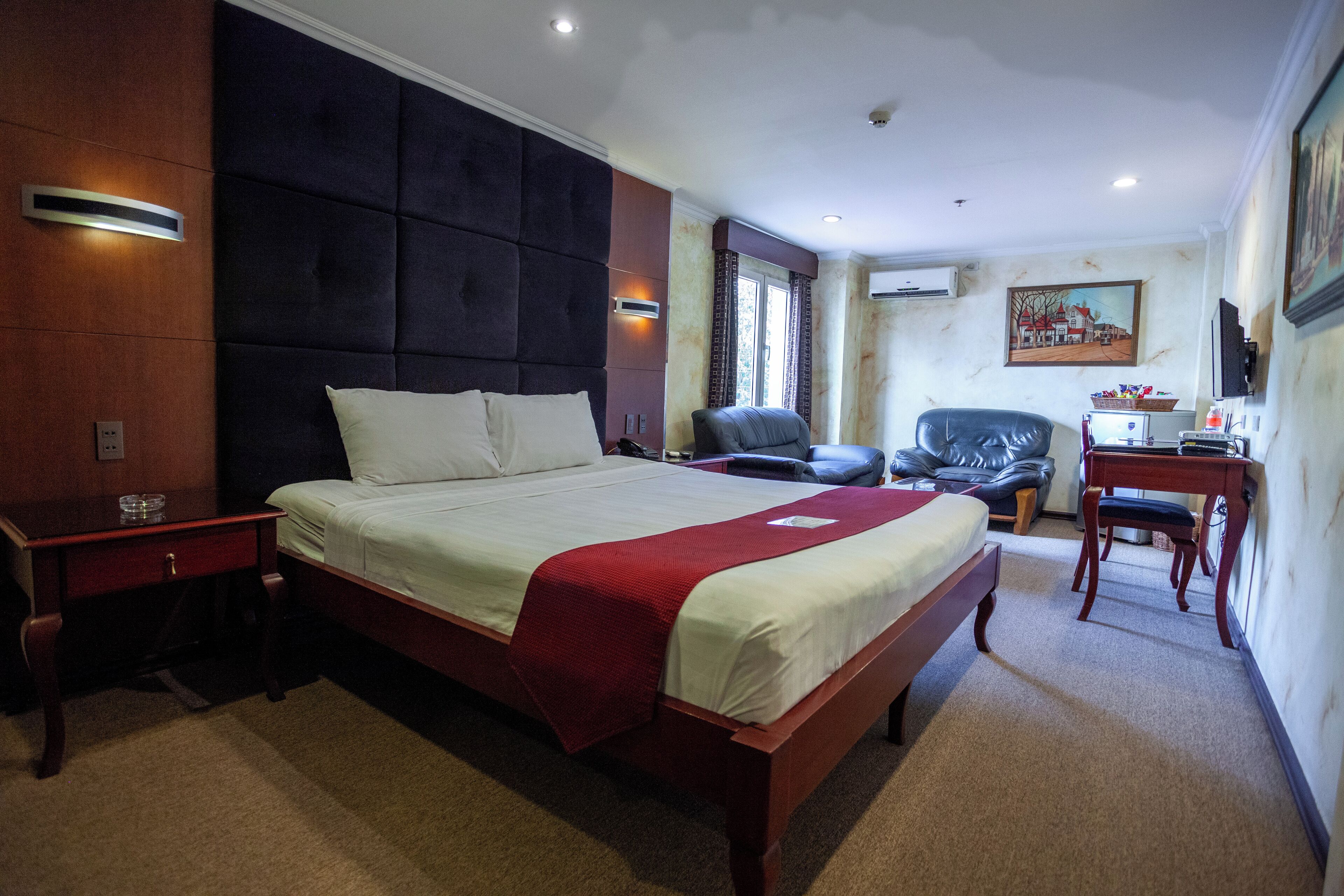 superior room | minibar, in-room safe, desk, laptop workspace