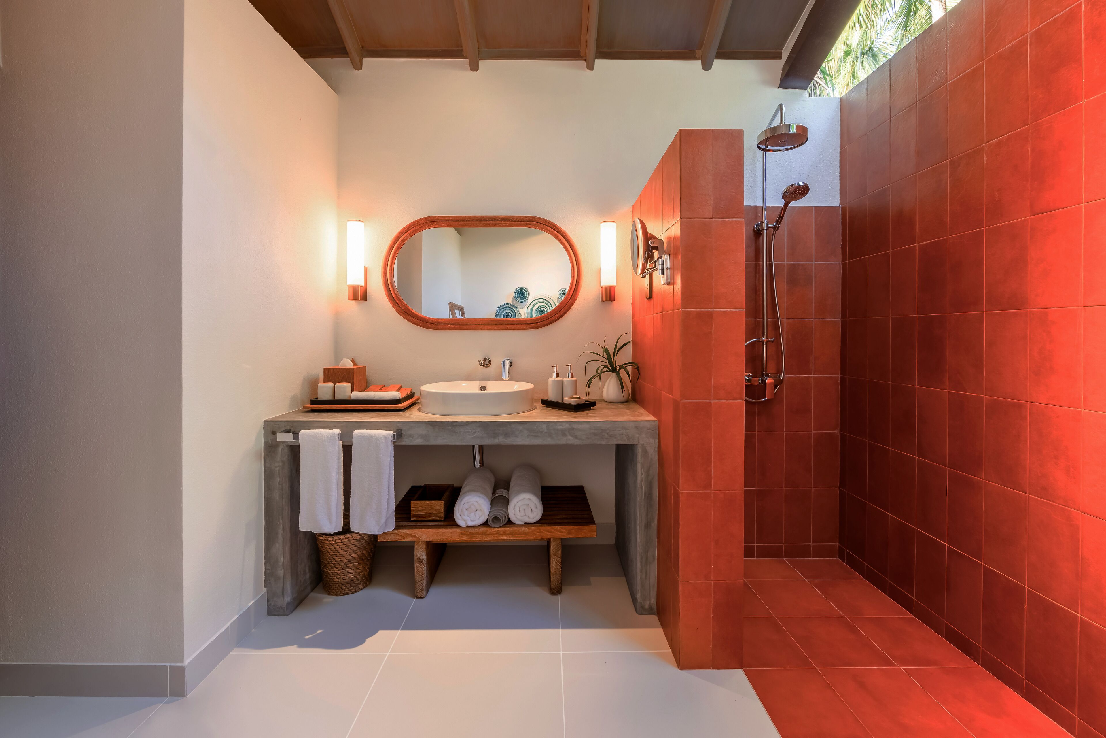 deluxe sunset villa with pool | bathroom | rainfall showerhead, eco-friendly toiletries, hair dryer, bathrobes