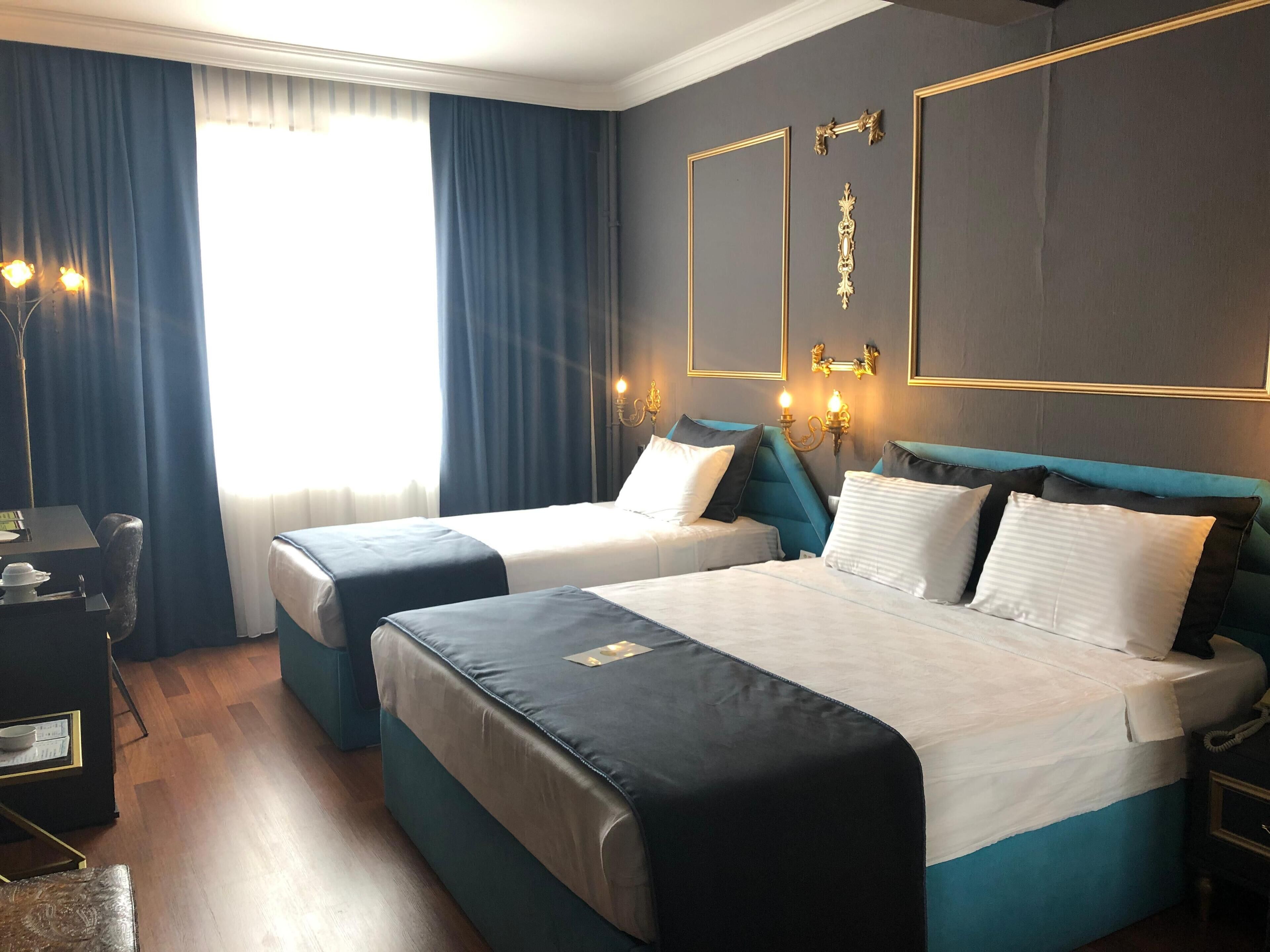 family room, 1 bedroom, city view | minibar, in-room safe, desk, soundproofing