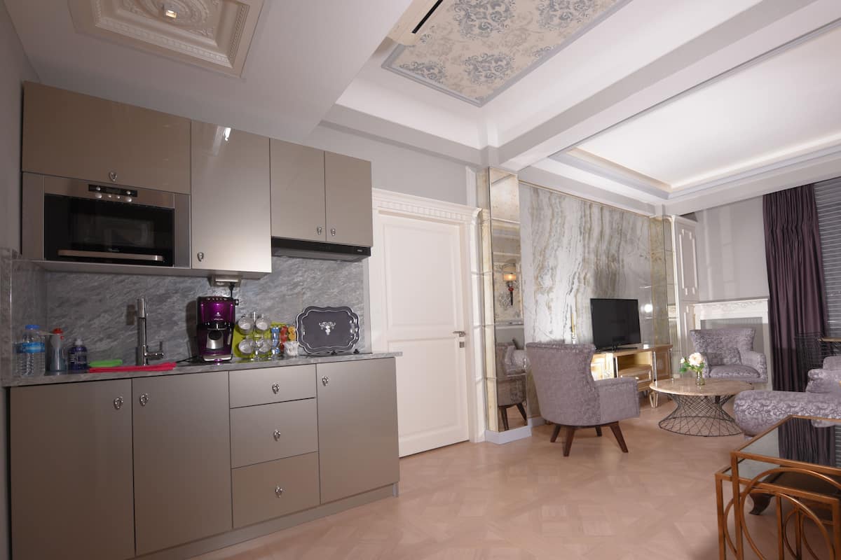 luxury condo, 1 bedroom, smoking, sea view | private kitchenette | electric kettle, eco-friendly cleaning products