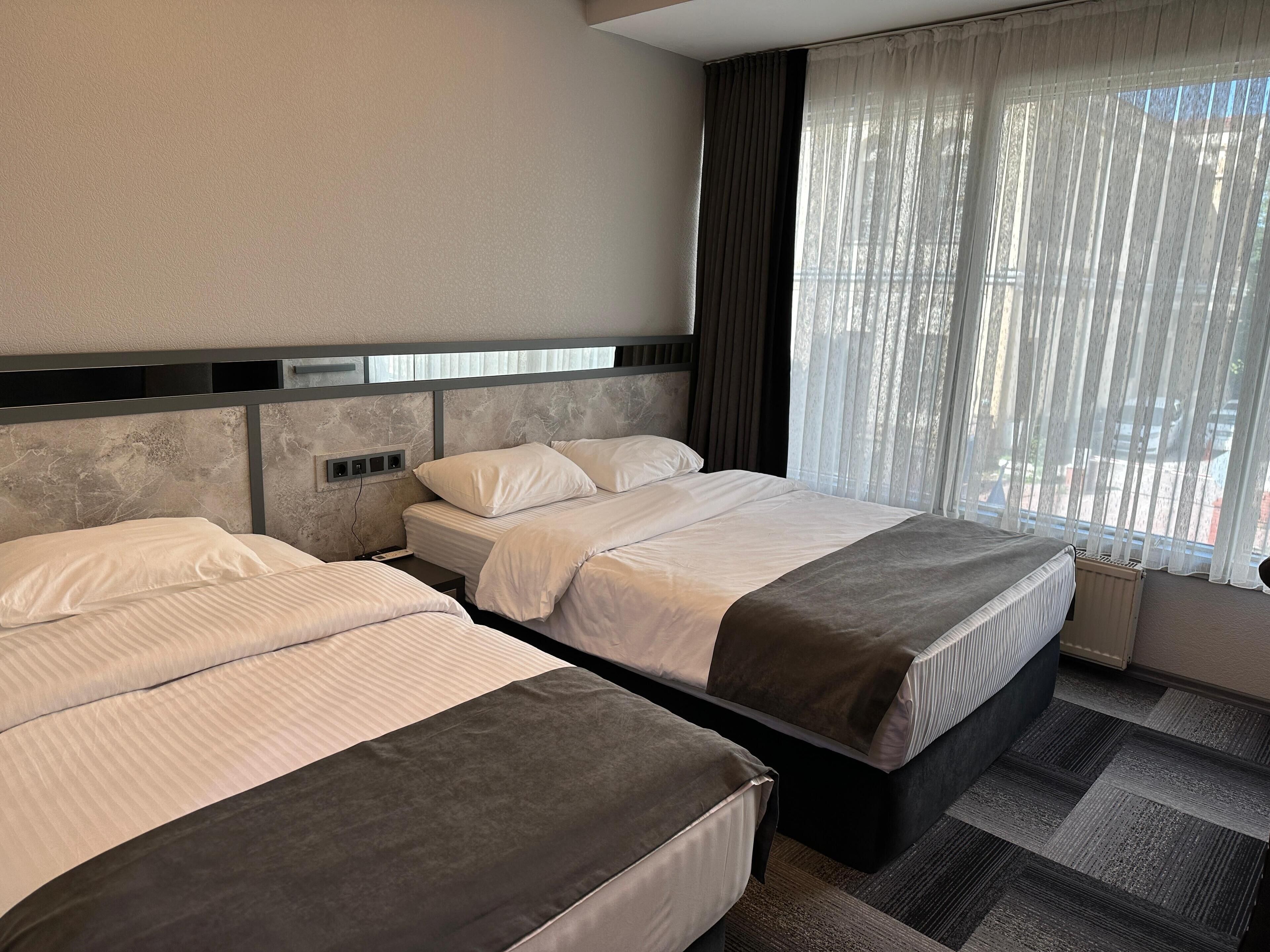 classic twin room, 1 bedroom, accessible, smoking | minibar, in-room safe, desk, soundproofing