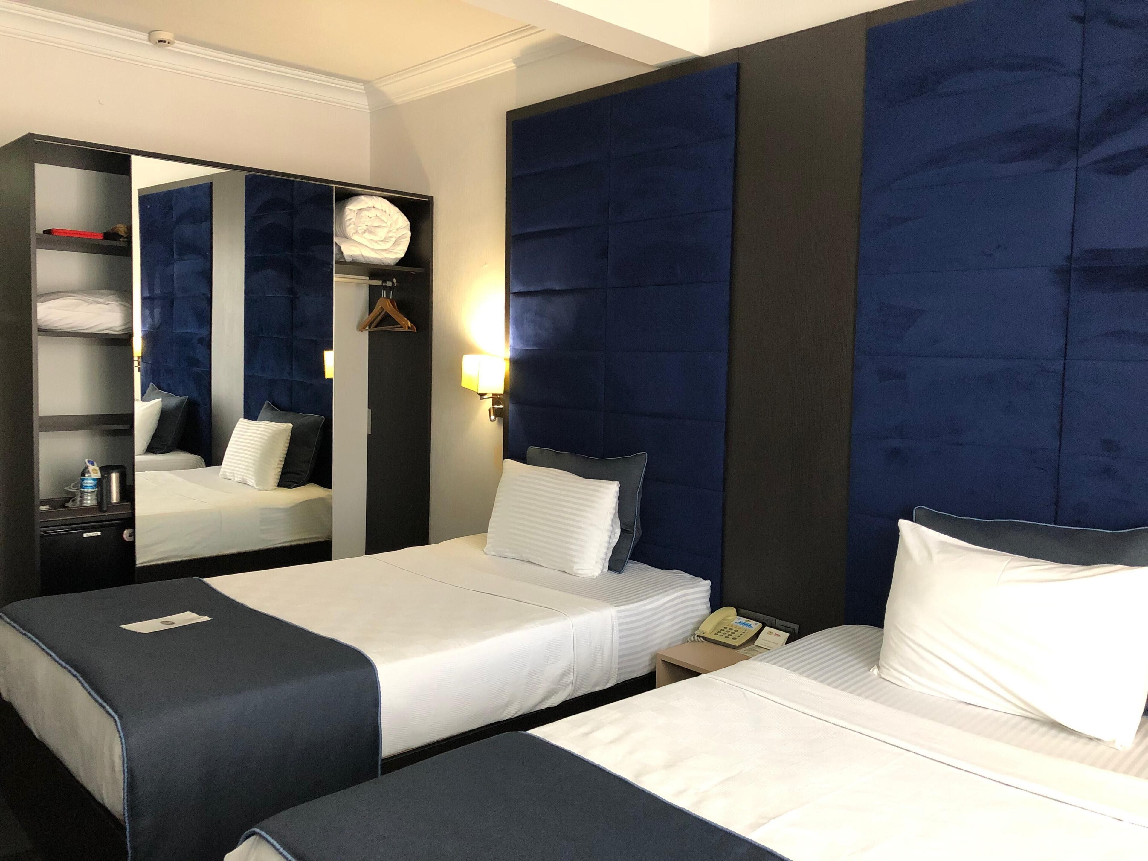 classic twin room, 1 bedroom, accessible, smoking | minibar, in-room safe, desk, soundproofing