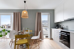 Three-Bedroom Apartment | Private kitchen | Coffee/tea maker, full-size fridge, microwave, oven - Bjørvika Apartments, Damsgård Area, Bergen city center (Bergen)