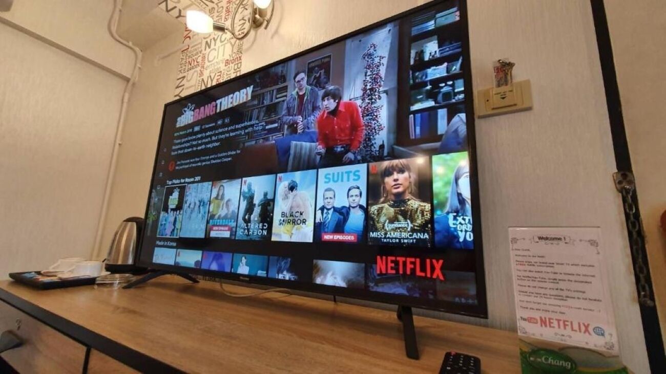 A television displaying various Netflix shows and movies.