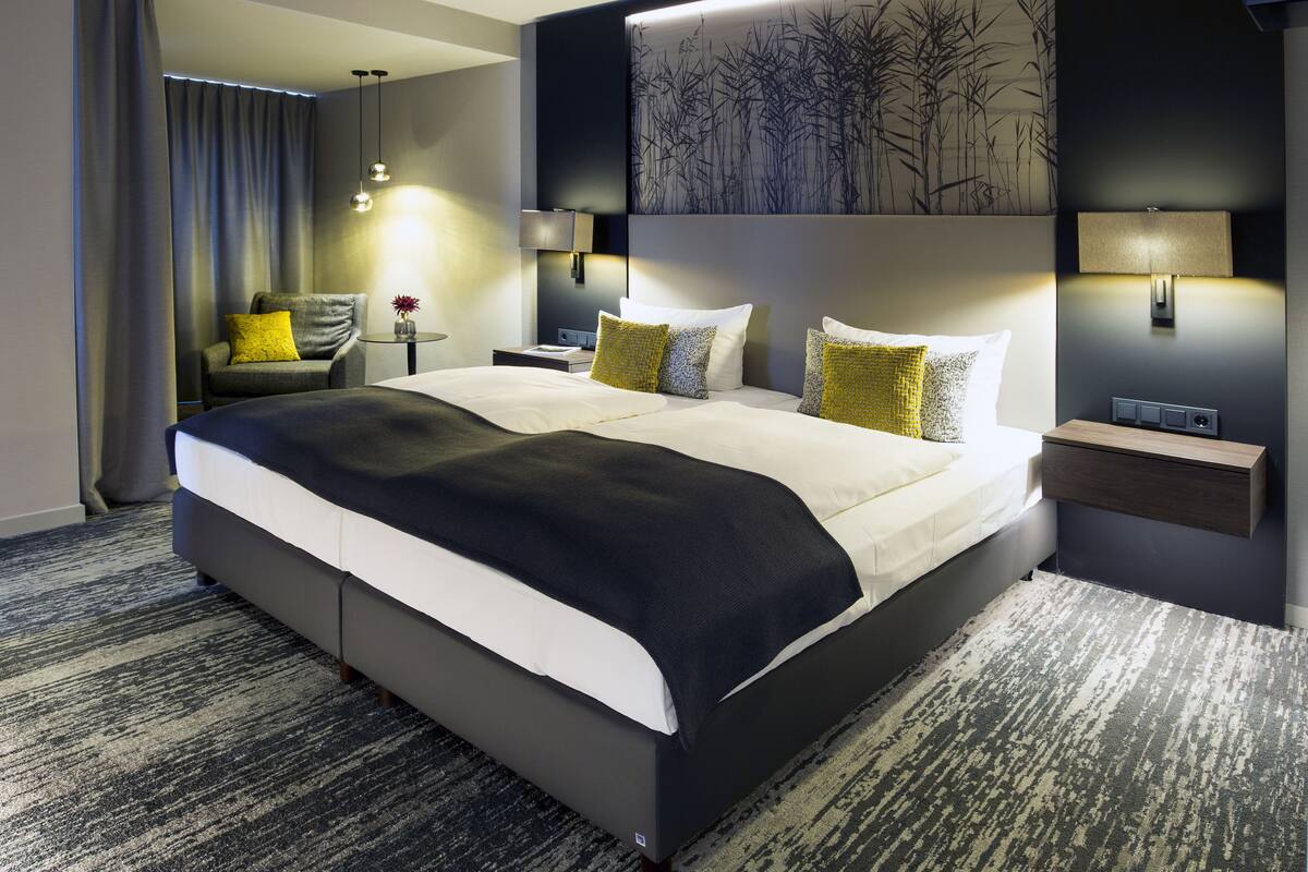 junior suite | premium bedding, in-room safe, desk, laptop workspace
