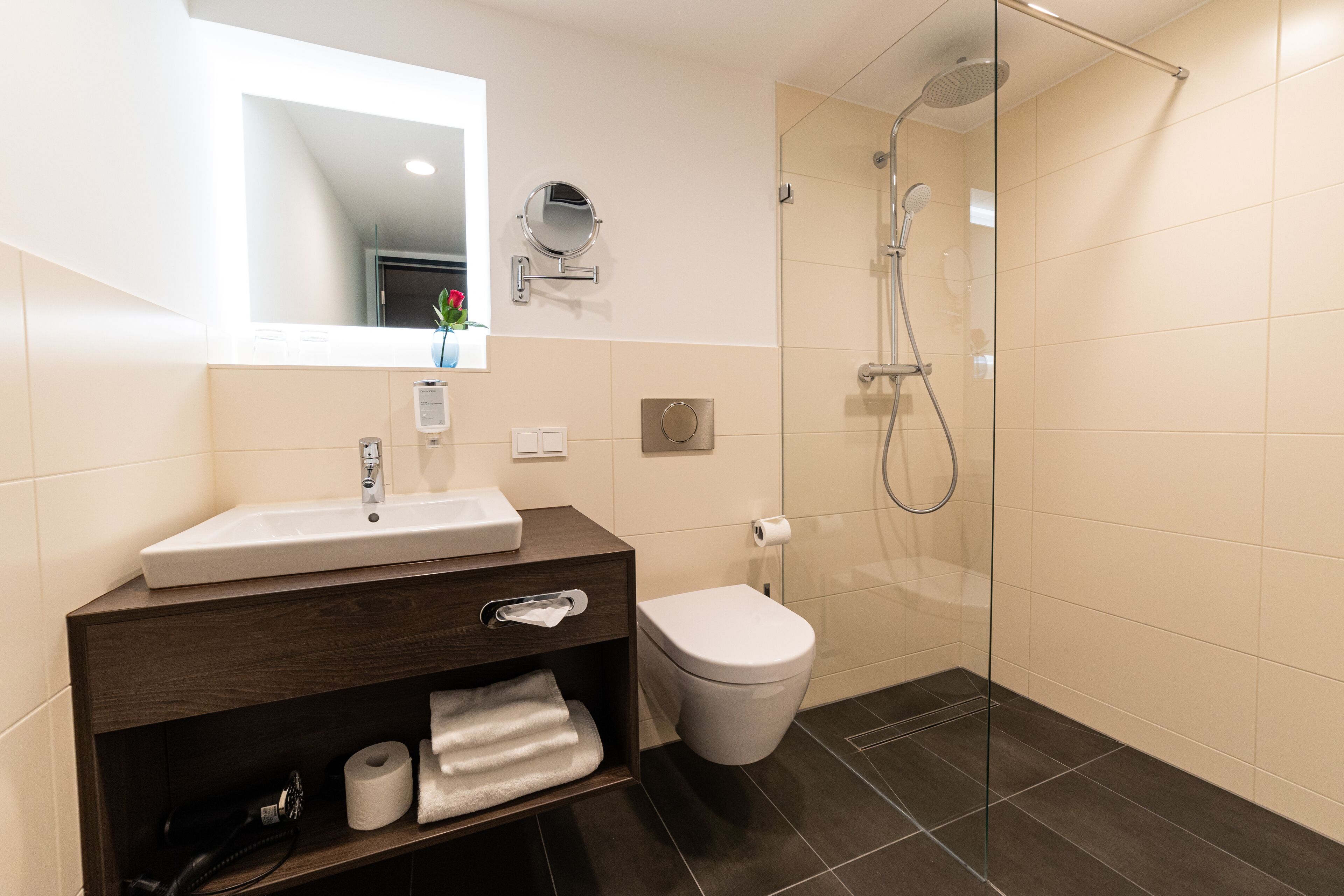 separate bathtub and shower, deep-soaking bathtub, rainfall showerhead