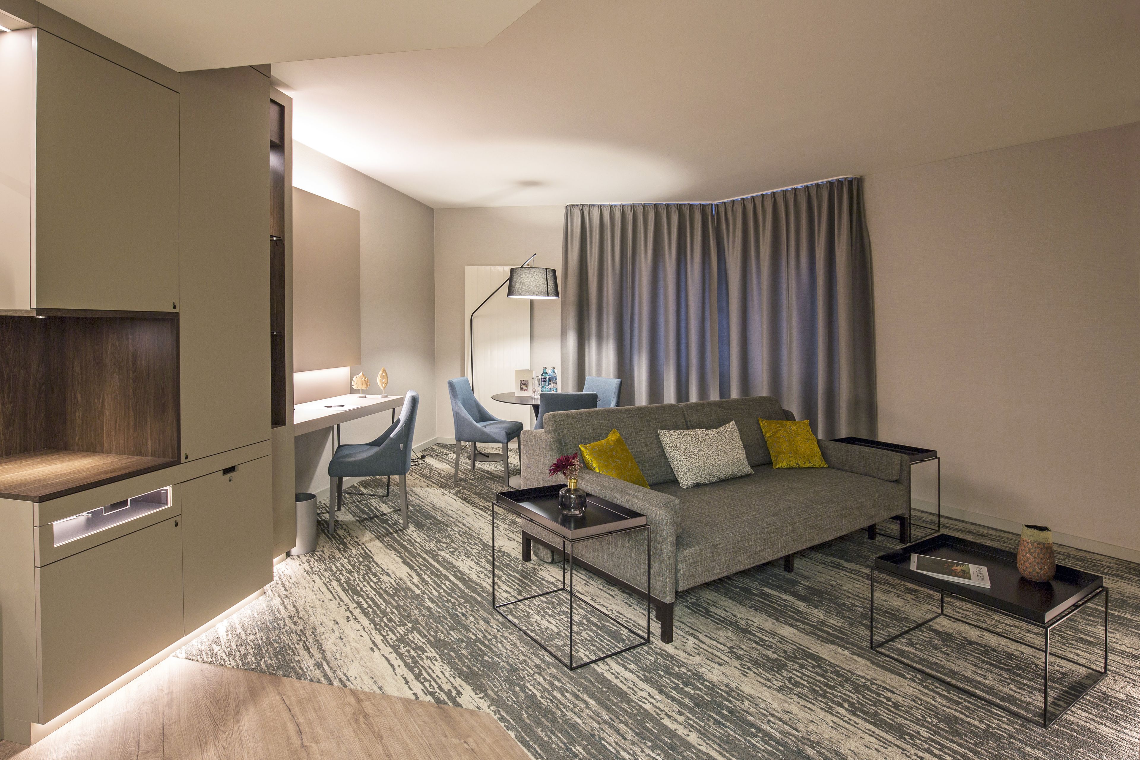 junior suite | living area | 49-inch flat-screen tv with cable channels, tv, tablet