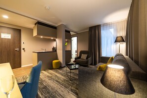 Deluxe Studio, 1 Bedroom, Non Smoking, Annex Building (Boardinghouse) | Living area | 49-inch flat-screen TV with cable channels, TV, tablet