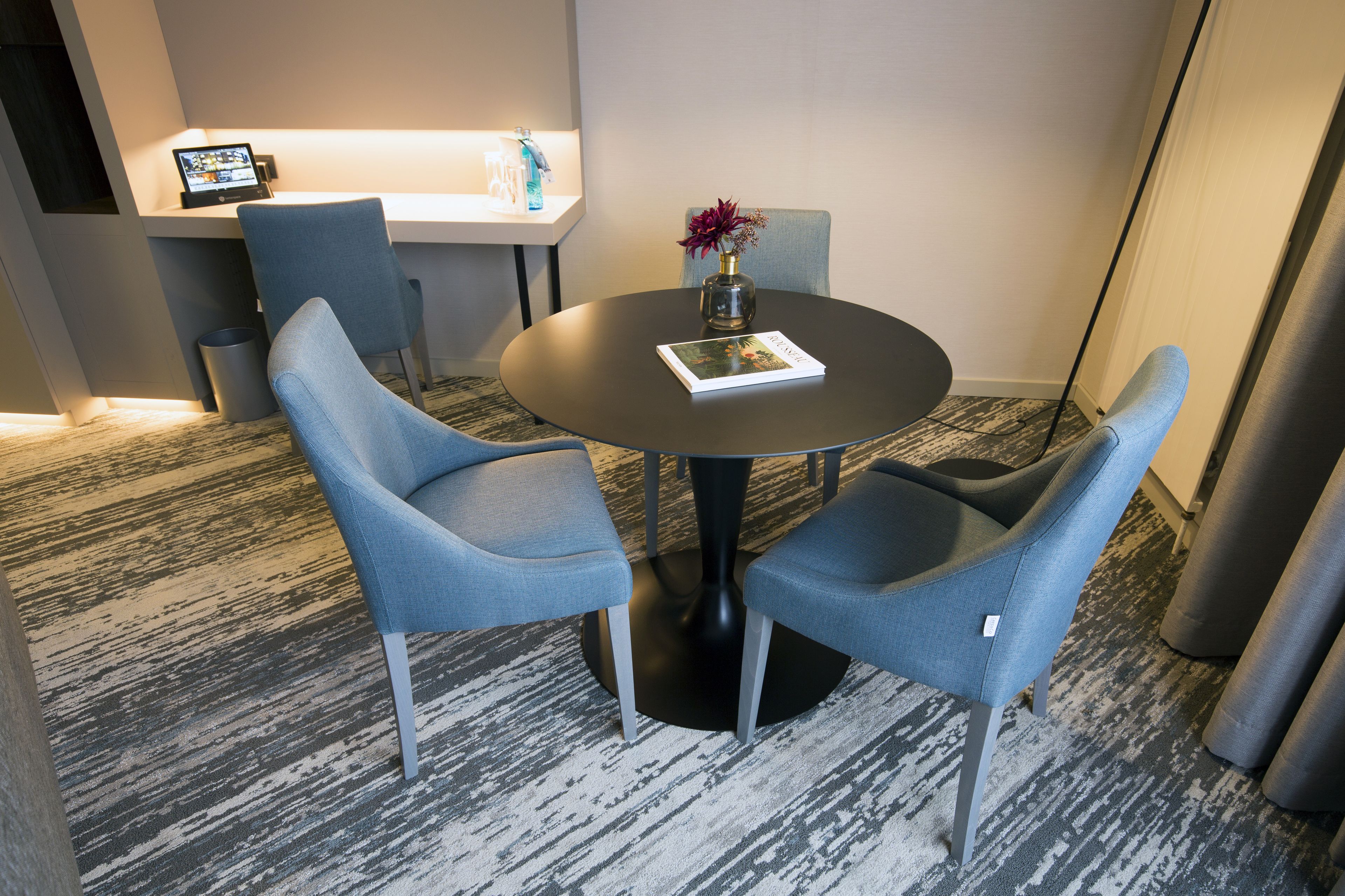 junior suite | living area | 49-inch flat-screen tv with cable channels, tv, tablet