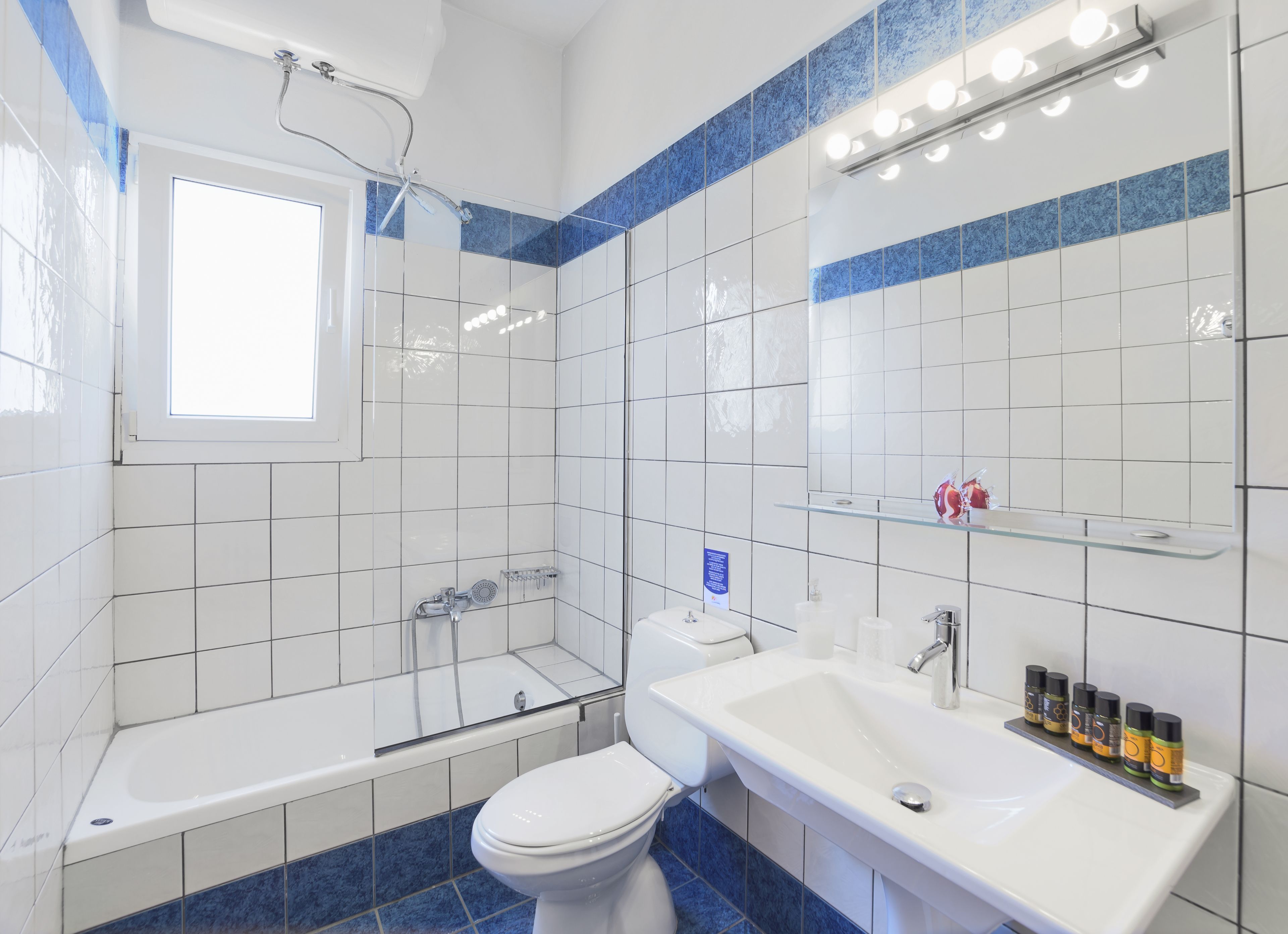 Villa, 2 Bedrooms (Red) | Bathroom | Shower, free toiletries, hair dryer, towels