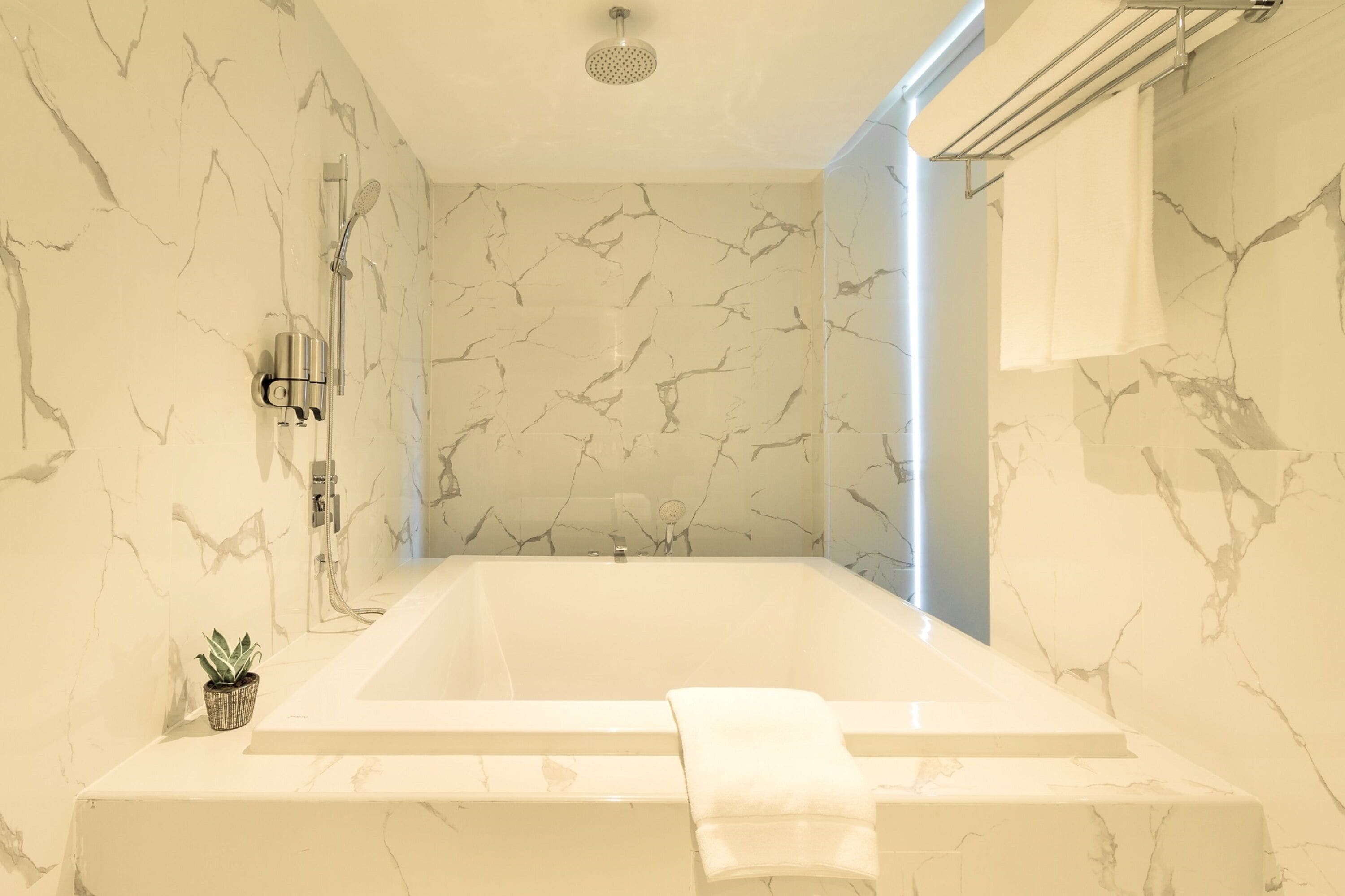 z-plus premier | bathroom | bathtub, free toiletries, hair dryer, dressing gowns