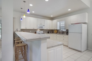 House, 3 Bedrooms | Private kitchen | Full-sized fridge, microwave, oven, stovetop - Guadalupe River Rock Retreat 9740 by RedAwning (New Braunfels)