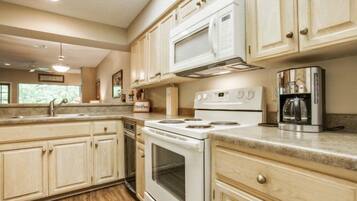Condo, 2 Bedrooms | Private kitchen | Fridge, microwave, oven, stovetop
