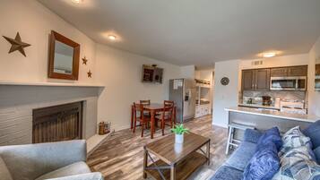 Condo, 1 Bedroom | Living room | TV, fireplace