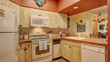 Condo, 2 Bedrooms | Private kitchen | Full-sized fridge, microwave, oven, stovetop