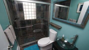 Shower, hair dryer, towels
