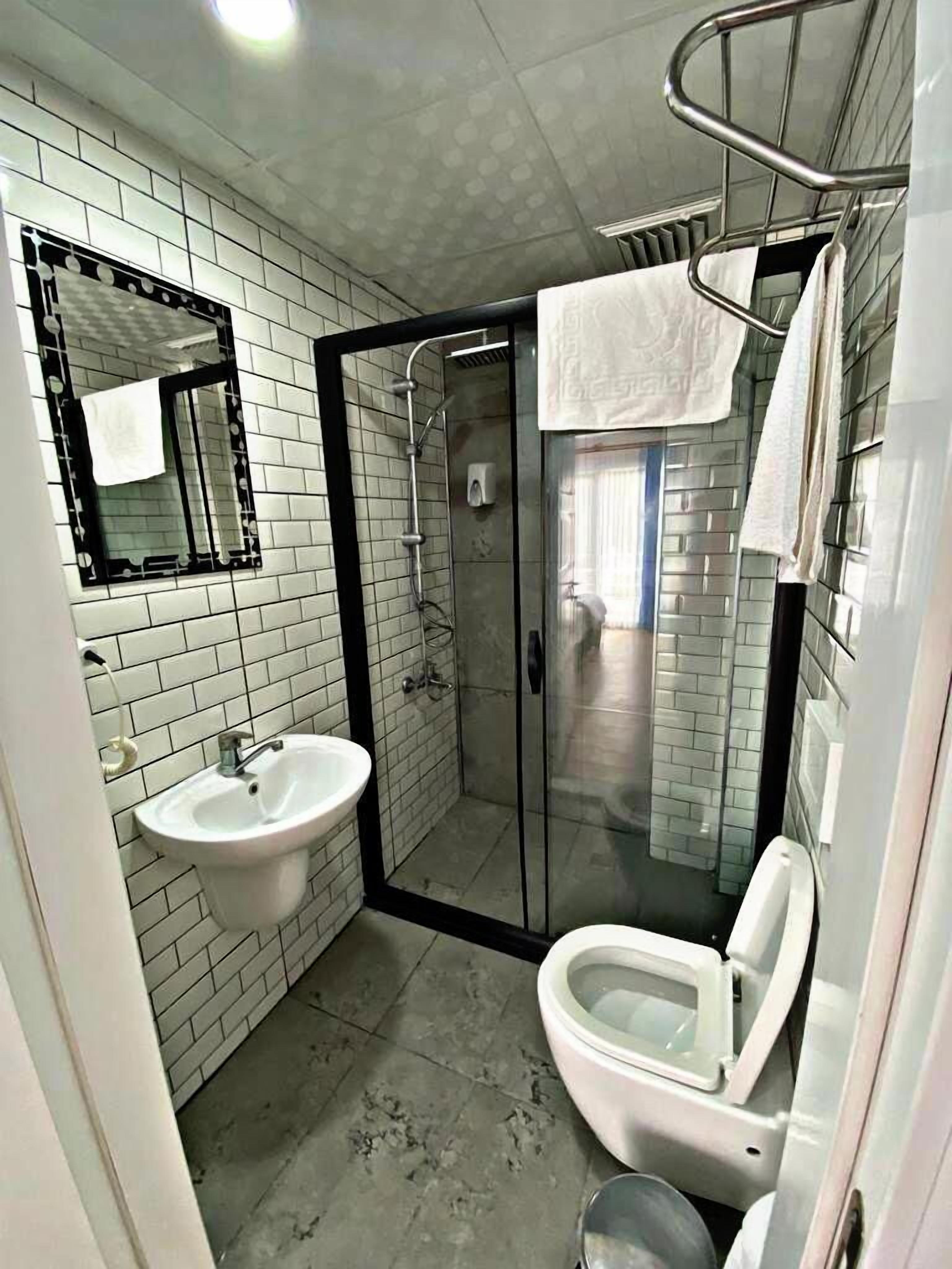 family room | bathroom | shower, free toiletries, hair dryer, towels