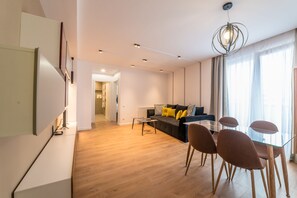 Apartment, 1 Bedroom, Balcony | Living room | Flat-screen TV - UBA Accommodation (Cluj-Napoca)