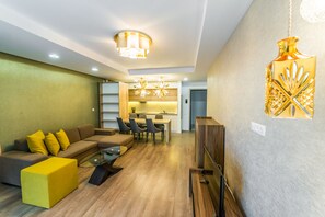 Standard Apartment, 1 Bedroom, Balcony | Living room | 60-cm flat-screen TV with cable channels, TV