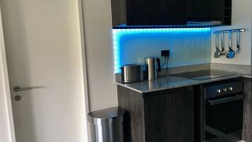 Standard Apartment, 1 Queen Bed | Private kitchen | Full-sized fridge, oven, stovetop, cookware/dishes/utensils
