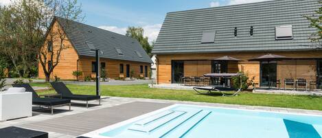 Outdoor pool, pool umbrellas, pool loungers