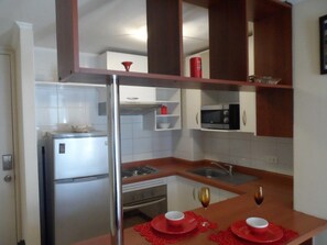 Standard Apartment, 2 Bedrooms | Private kitchen | Fridge, microwave, oven, stovetop