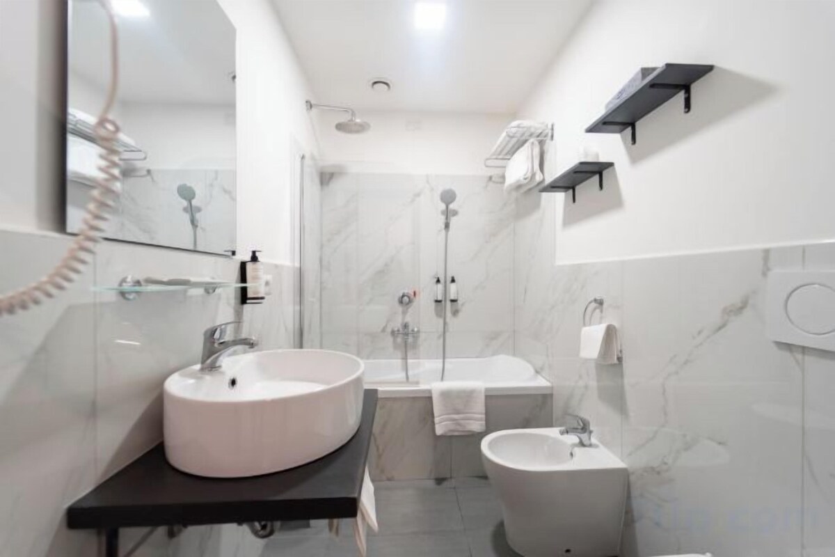 Bathroom | Shower, free toiletries, hair dryer, bathrobes