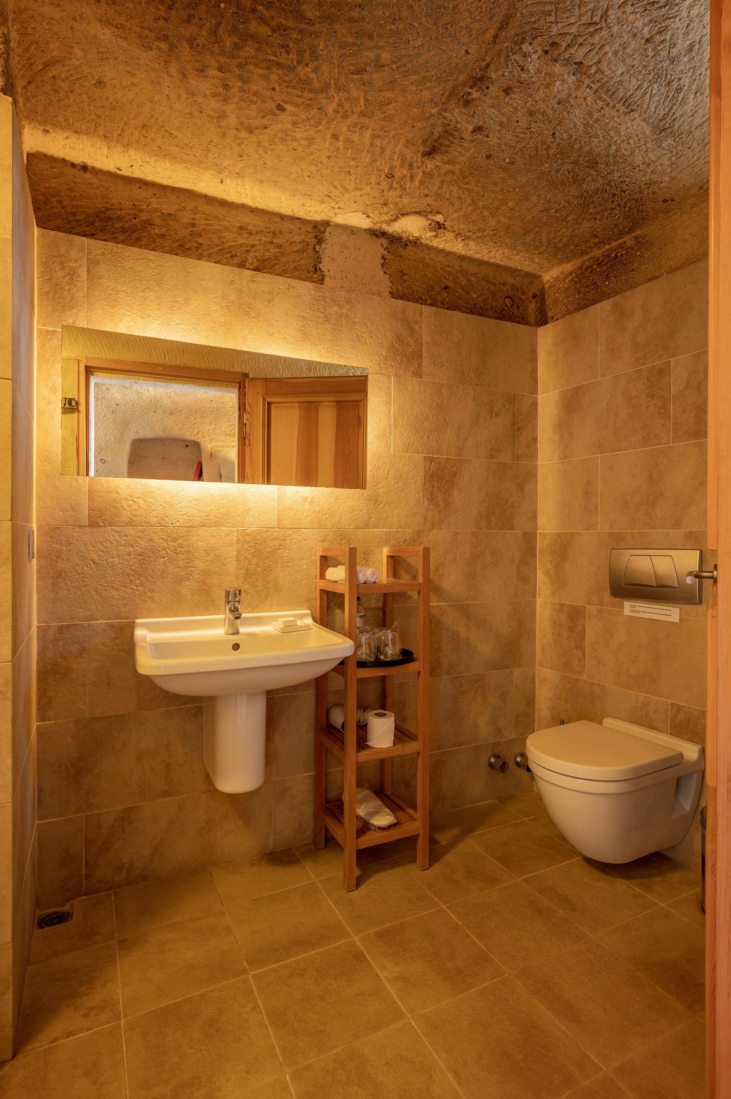 deluxe double room (cave) | bathroom | shower, free toiletries, hair dryer, slippers