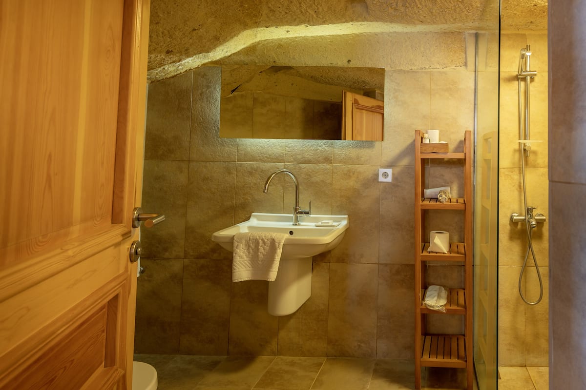 double cave room | bathroom | shower, free toiletries, hair dryer, slippers