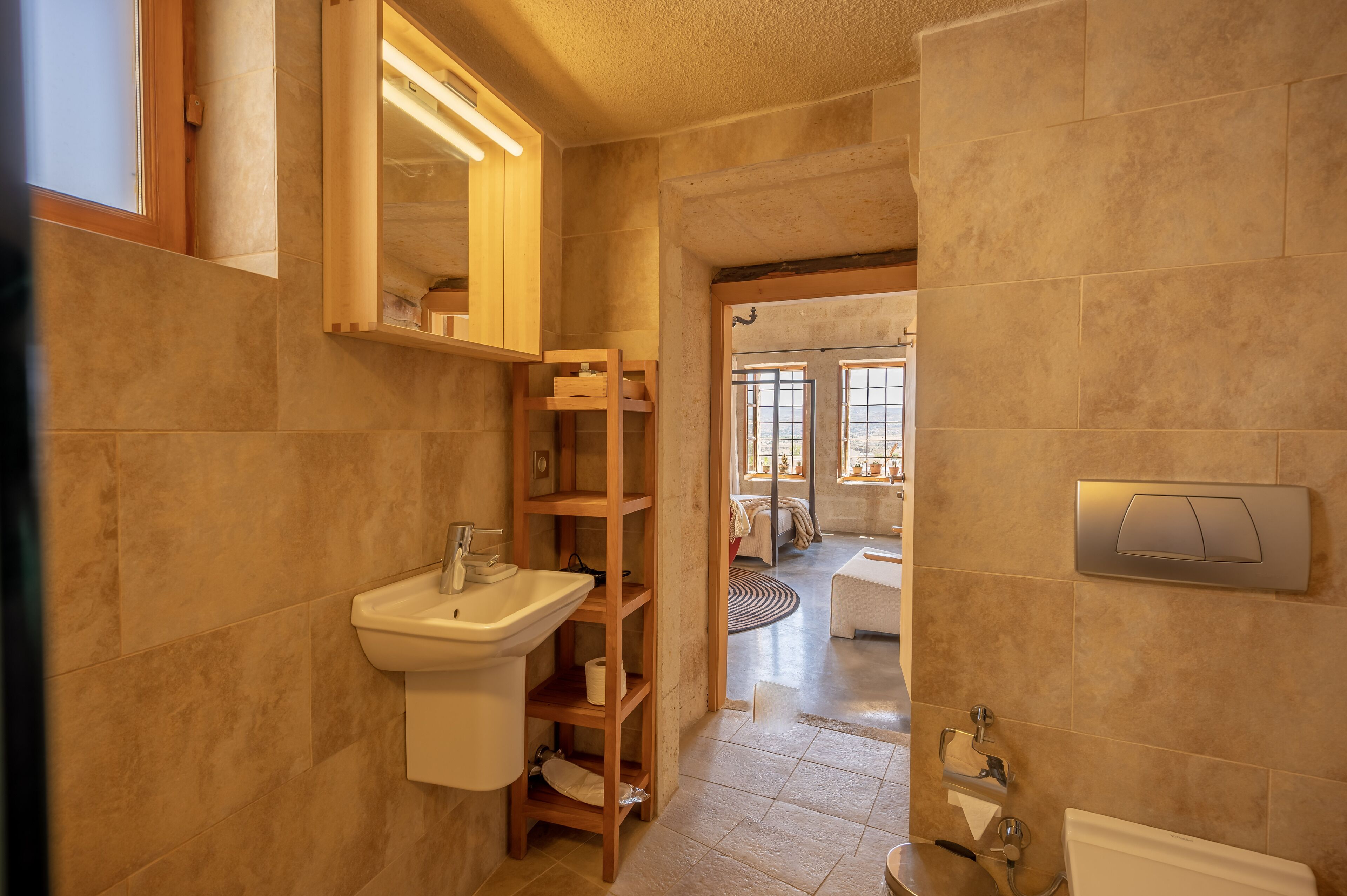 stone deluxe room with view | bathroom | shower, free toiletries, hair dryer, slippers
