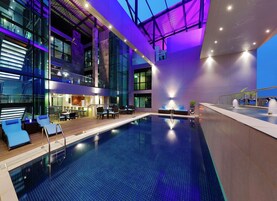 Indoor pool, open 7 AM to 6 PM, pool umbrellas, pool loungers
