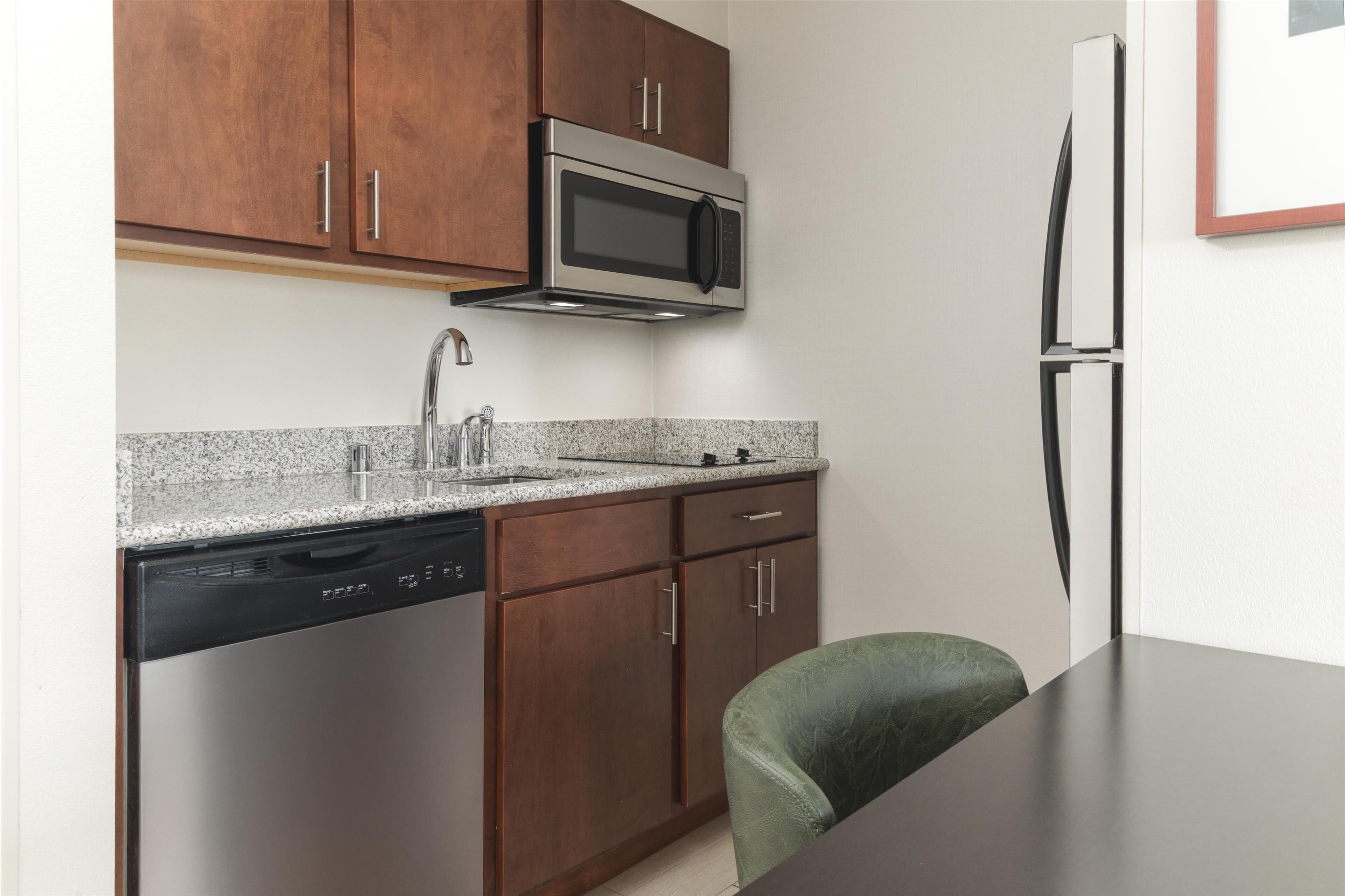 full-sized fridge, microwave, dishwasher, coffee/tea maker